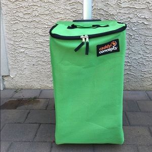 Portable hamper with wheels and pop up handle